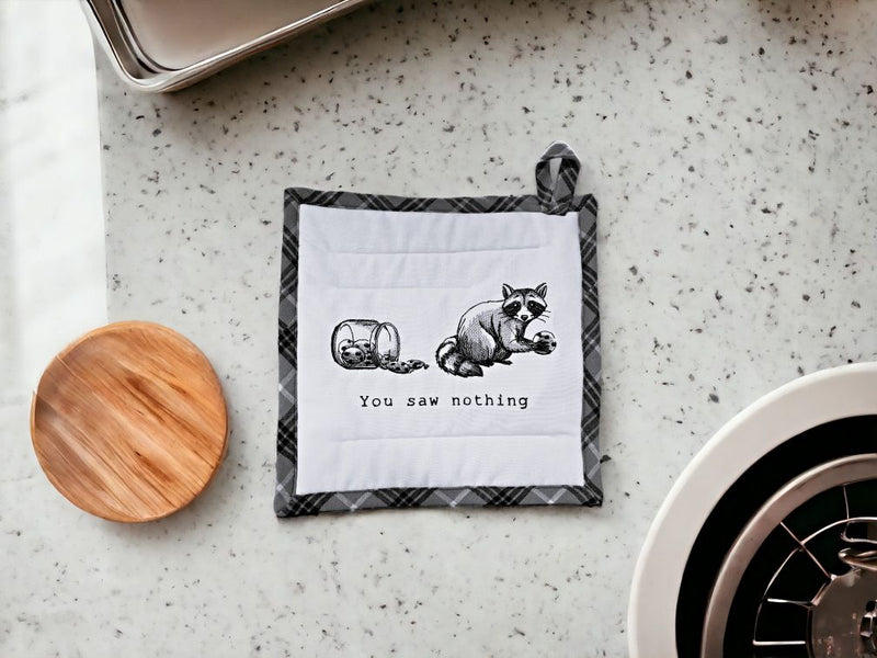 Shop Harvest Array for cute, embroidered potholders with humorous sayings like this one with "You saw nothing" and a picture of a raccoon stealing a cookie from the cookie jar!