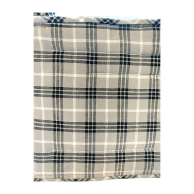 The back of the Raccoon Thief Potholder is sewn with a black, brown, and white plaid material.