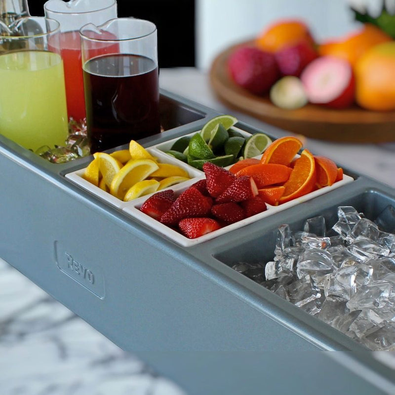 Close of Two Condiment Trays that are a perfect fit in the Party Barge from REVO Coolers and Harvest Array.