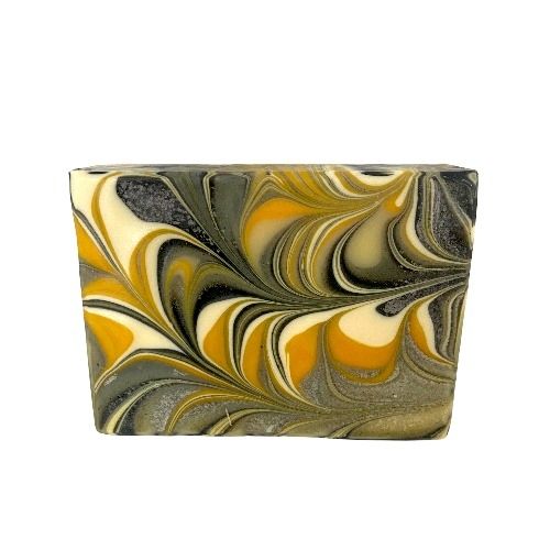 Lemongrass scented Handmade Goats Milk Bar Soap is swirled with yellow and grey colors.