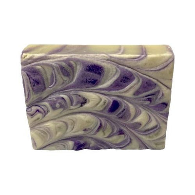 Lilac scented Handmade Goats Milk Bar Soap is swirled with purple and cream colors.