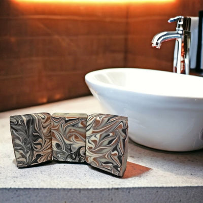 Relax in the tub with the woodsy, earthy scent of this gentle Sandalwood Goats Milk Soap, made in MN, for Harvest Array.