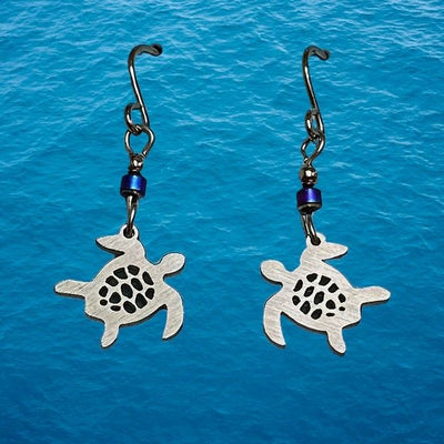 Sea Turtle Stainless Steel Earrings. The turtles are swimming towards each other.
