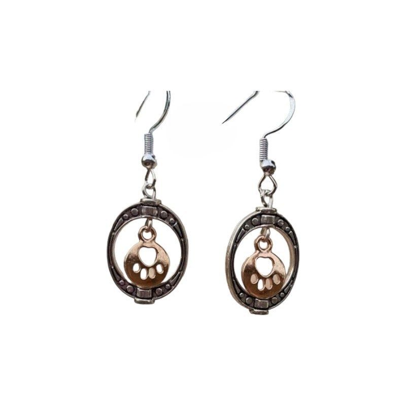 Oval Frame with Gold Toned Paw Print Charm Earrings made by an artist in Maryland.