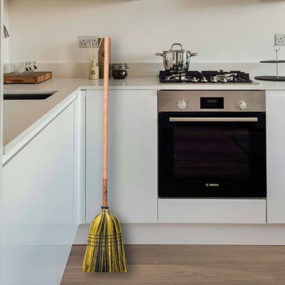 Looking for Amish-made Medium Brooms with hardwood handles and natural broomcorn bristles? Harvestarray.com has what you need in a variety of colors. Shown here is a yellow  and black broom.