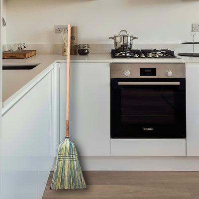 Stoltzfus Medium Brooms with hardwood handles and natural broomcorn bristles. Shown here in yellow and blue bristles. Made in the USA for Harvest Array.