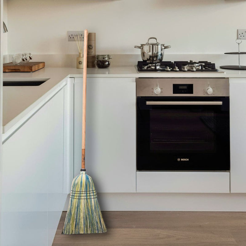Stoltzfus Medium Brooms with hardwood handles and natural broomcorn bristles. Shown here in yellow and blue bristles. Made in the USA for Harvest Array.