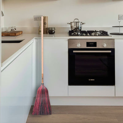 Shop Harvest Array's selection of colorful Stoltzfus Medium Brooms with hardwood handles and natural broomcorn bristles. Shown here in red and black bristles.