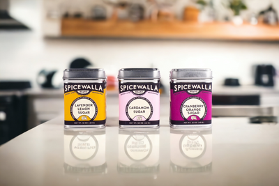 Elevate your culinary creations with Spicewalla's Three Sugar Collection. Experience the delicate flavors of lavender lemon, cardamom, and cranberry orange.