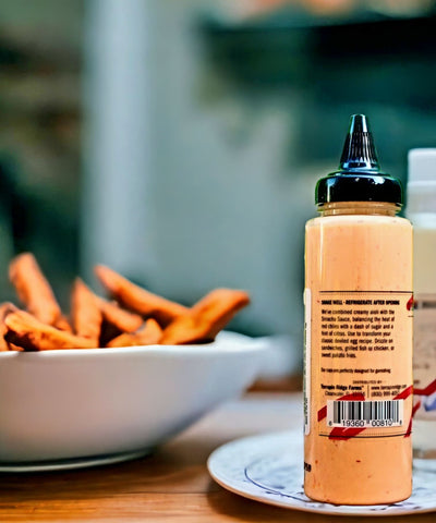 Terrapin Ridge Farms Sriracha Aioli Squeeze Garnishing Sauce at Harvest Array is a creamy Aioli combined with heat of the Sriracha Sauce for a delicious garnishing sauce.