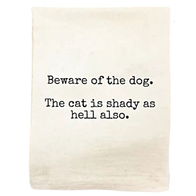 Closeup of Kitchen Towel with saying, "Beware of the dog. The cat is shady as hell also." Made in the USA. 