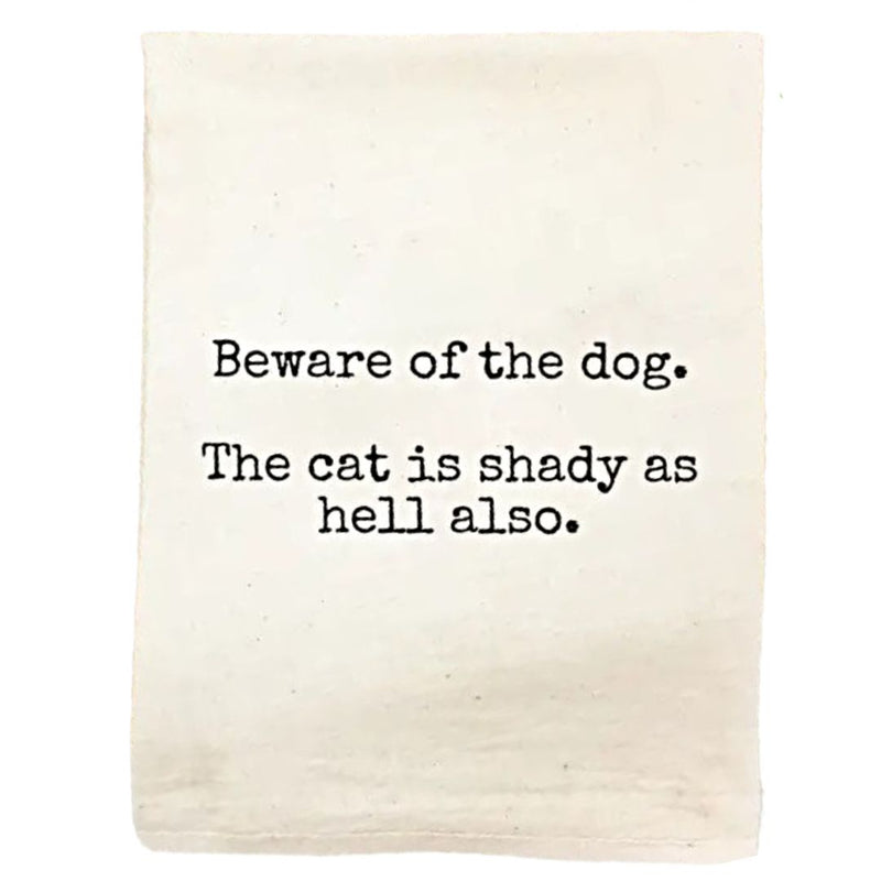 Closeup of Kitchen Towel with saying, "Beware of the dog. The cat is shady as hell also." Made in the USA. 