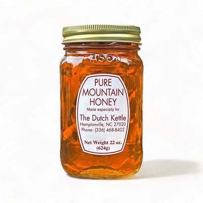 Savor The Dutch Kettle's Amish Honey—premium organic raw honey derived straight from the heart of nature.