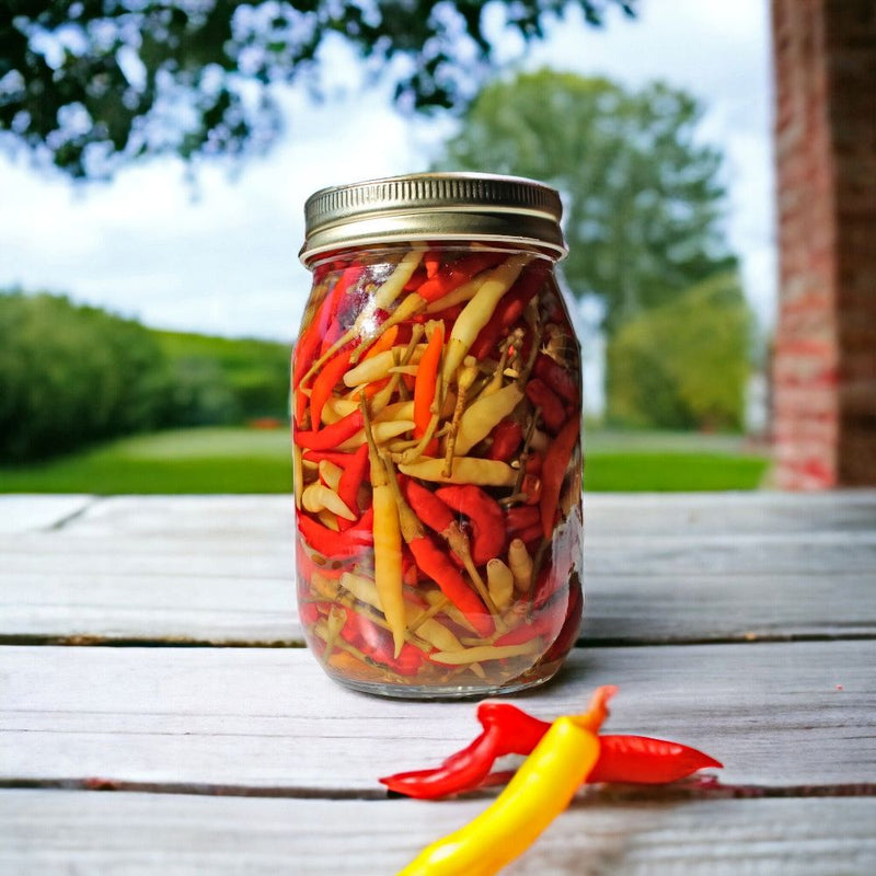 Just Hot Peppers, Water, Vinegar, and Salt are included in &