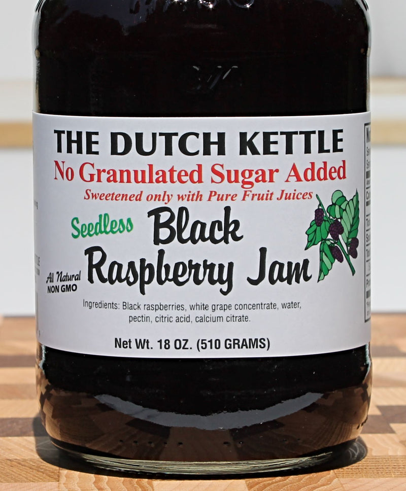 Close up of The Dutch Kettle Seedless, No Granulated Sugar Added Black Raspberry Jam to show ingredient list.