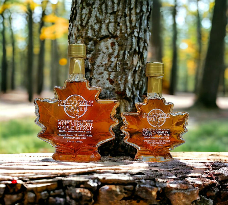 Amazing amber color of the Rich, Pure Vermont Maple Syrup available in 3.4 or 8.5 Ounce Glass Leaf Bottles at Harvest Array.