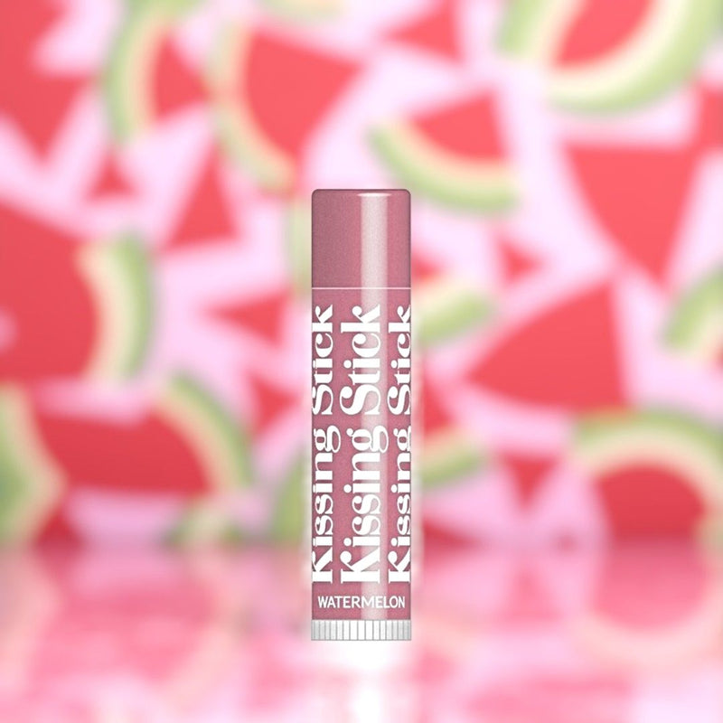 Kissing Stick watermelon-flavored lip balm against a watermelon patterned background
