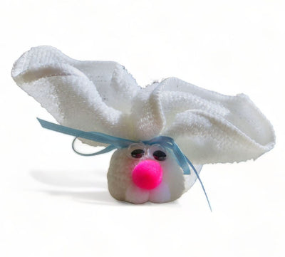 Our Washcloth bunny decorations are made of a washcloth, ribbon, googly eyes, a pick nose and white cotton ball teeth.  