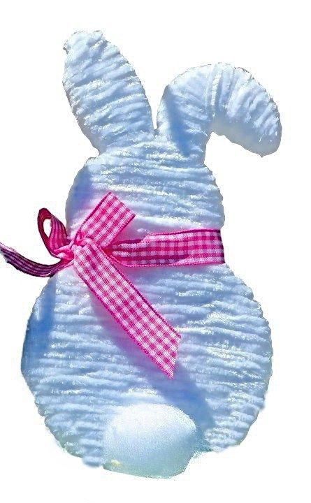 Handmade Easter and Spring Bunny Decoration crafted with white yarn, a cotton tail, and a pink and white check ribbon. Purchase now for Easter!