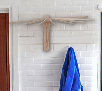 Attach our 8 Arm Clothes Rack to your bathroom wall to steam out wrinkles in clothing while taking a shower. 
