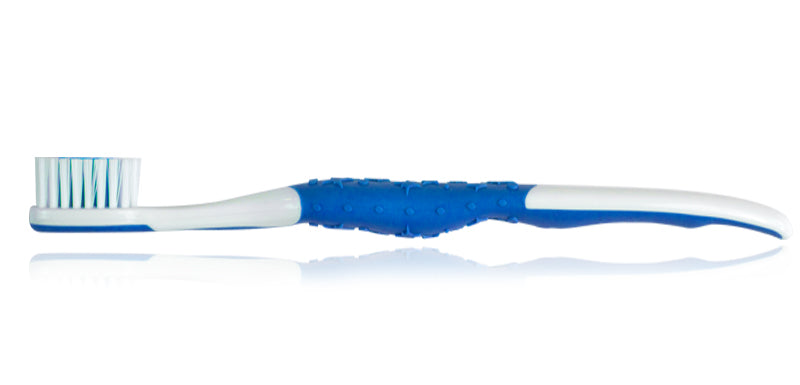 Textured Grip Youth Toothbrush in blue - laying flat