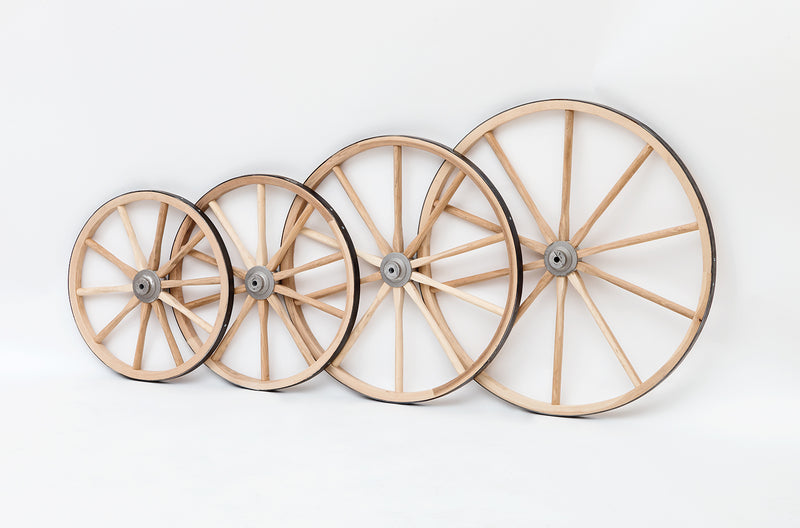 Three light duty wooden cart wheels displayed on a white background