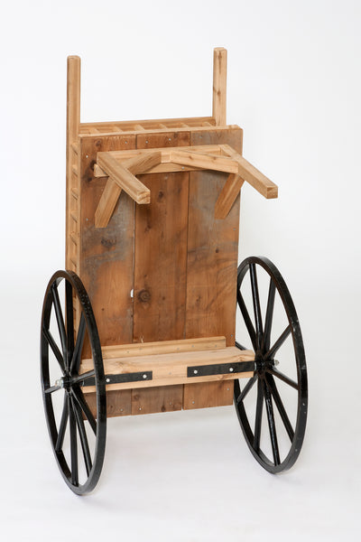 The underside of the Amish Red Cedar Peddlers Cart