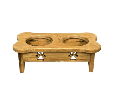 Elevate your dog's mealtime with our Amish-crafted wooden dog feeders. High-quality and comfortable, these raised bowls come in a set of two.