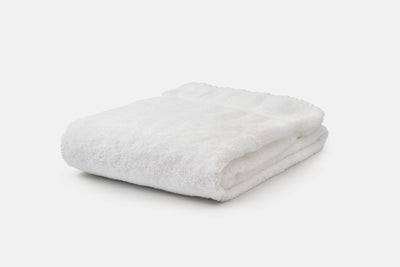 Oversized, soft and comfy white bath towel.
