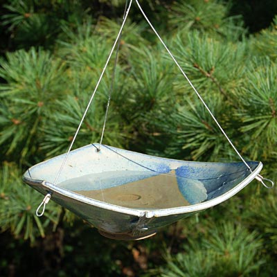Blue Hanging Ceramic Bird Bath in use