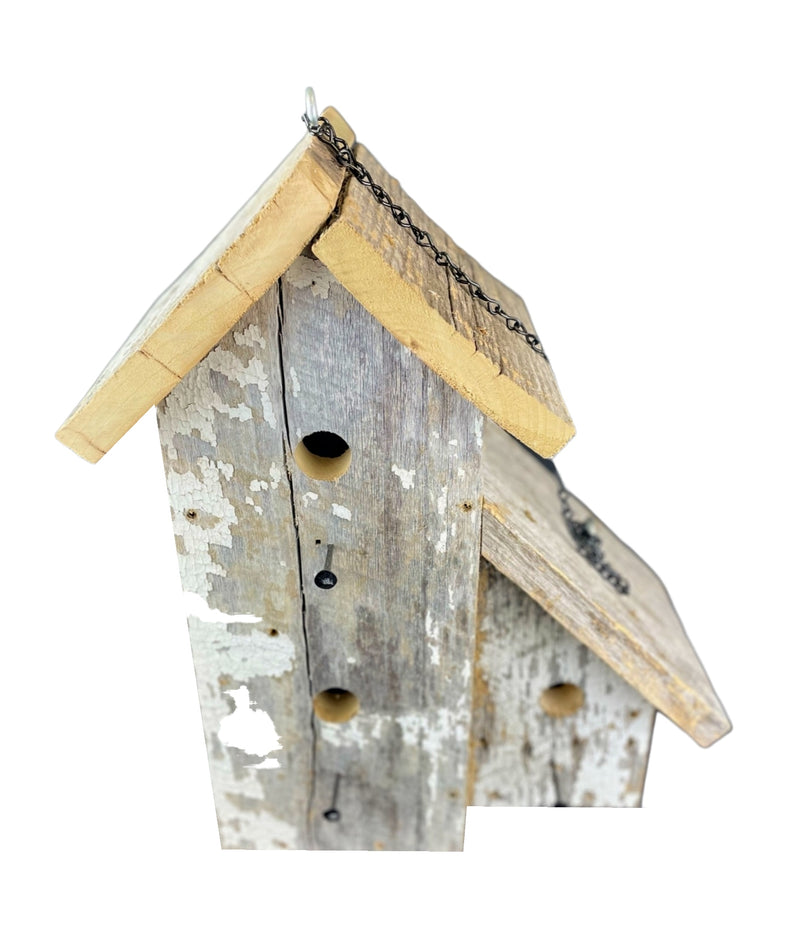 The roofs are slanted so the rain runs off and the nests and birds inside do not get wet in this Three-Room Birdhouse.