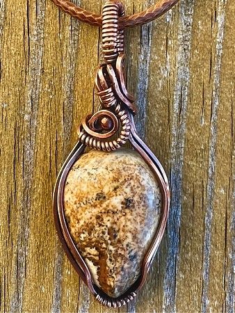 Brown/Yellow Jasper Teardrop Pendant in Oxidized Copper Wire on a waxed brown 18 inch cord