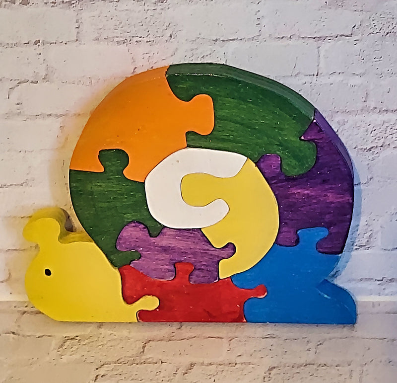 Ten Piece Handmade Colorful Snail Puzzle