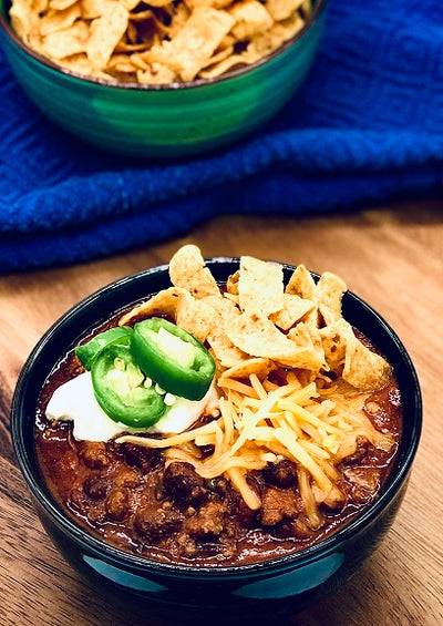 Hearty and delicious Carmie's Kitchen Campfire Chili Mix.  Top with your favorite toppings like cheese, sour cream and crispy tortilla strips.