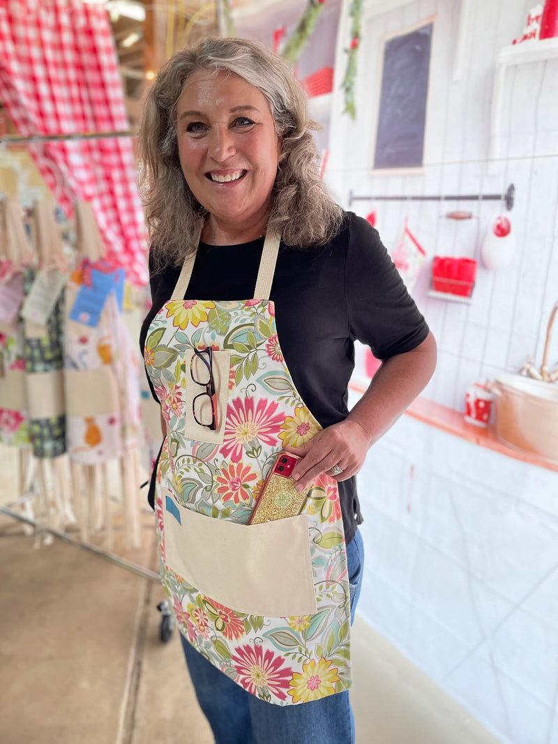 Charlotte Retro Flower Print Apron being worn