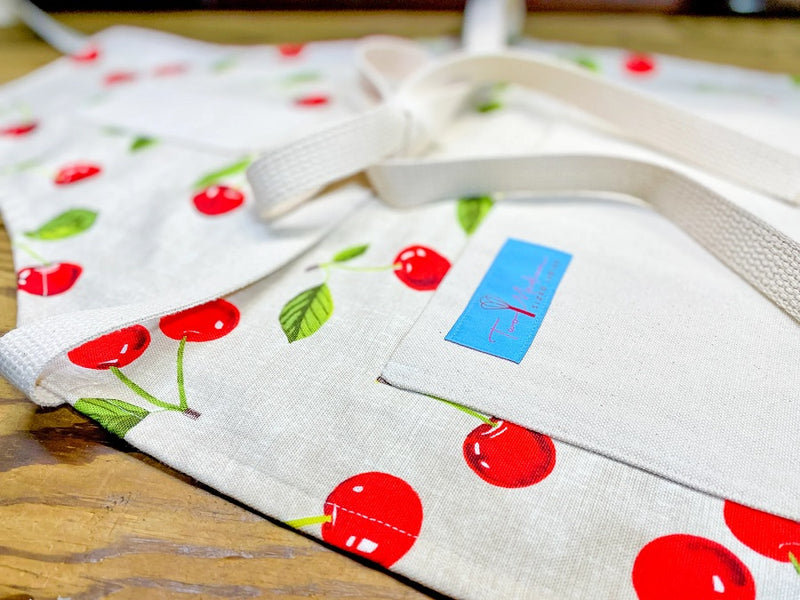 Close up of the Cherie Cherry Print Apron