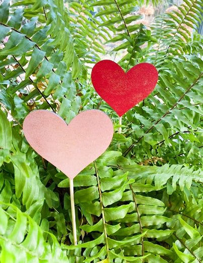 A red and a pink Mini Classic Heart Plant Stake