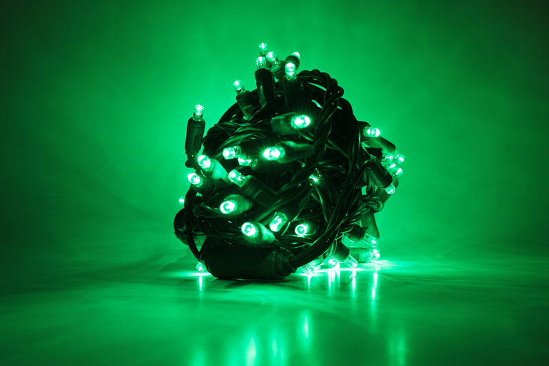 Outdoor LED Lighted Christmas Tree with Green Base and Green and Purple Tree Lights