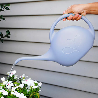 This blue Half-Gallon Watering Can is a great size for small house plants  on you porch From Harvest Array