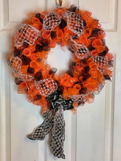 Handmade Orange and Black Deco Mesh Wreath perfect as a Halloween decoration or to show pride in your favorite sports team.
