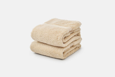 These Bathroom Hand Towels are available in beige or white to accent any bathroom style.
