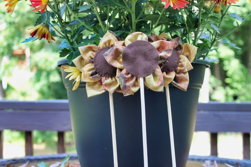 Handcrafted Fall Flowers on Stick Stem by a group of Mums