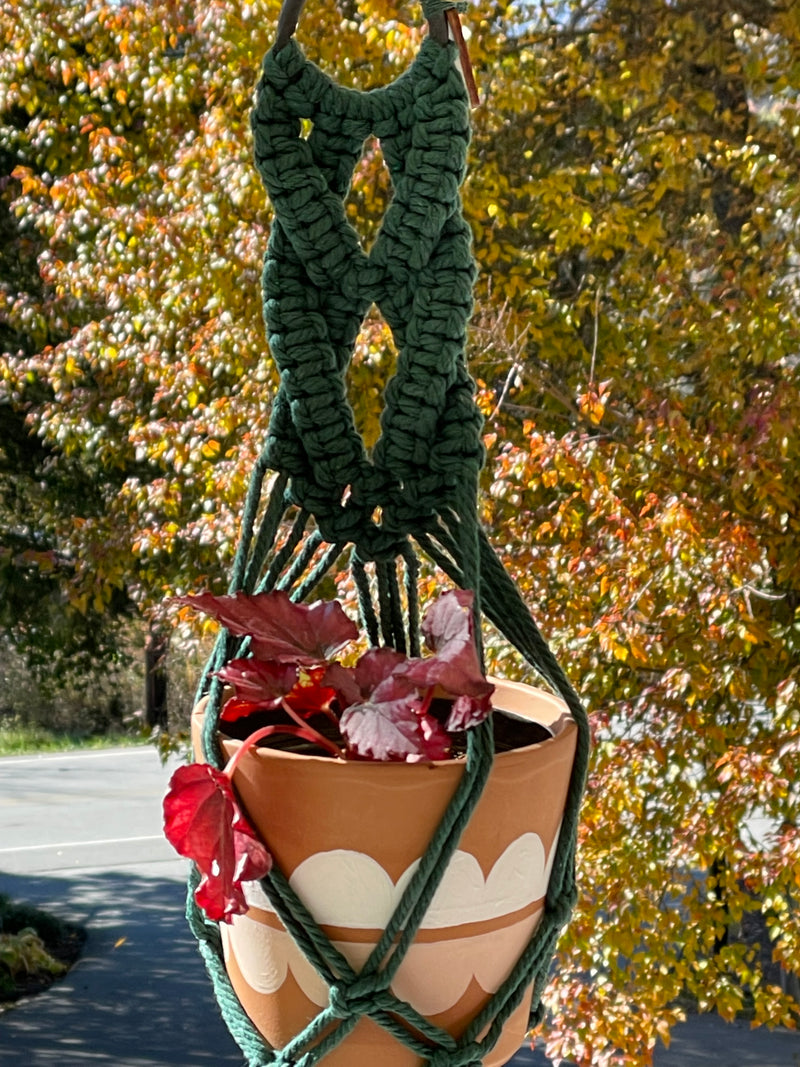 Close up of the detailed work of our Marie Macramé Plant Hanger.