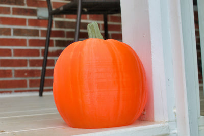 Lighted Pumpkin on the Porch