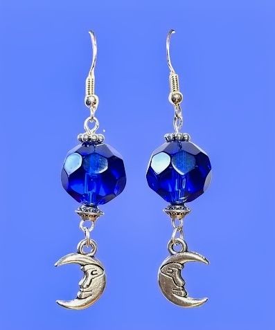 Moon Charm with Blue Bead Earrings handcrafted by a woman owned and operated small business.