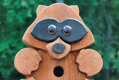 Close up of the Raccoon Shaped Amish Made Birdhouses From Harvest Array