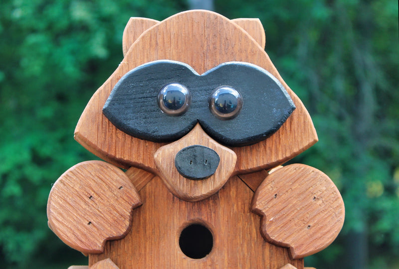 Close up of the Raccoon Shaped Amish Made Birdhouses From Harvest Array