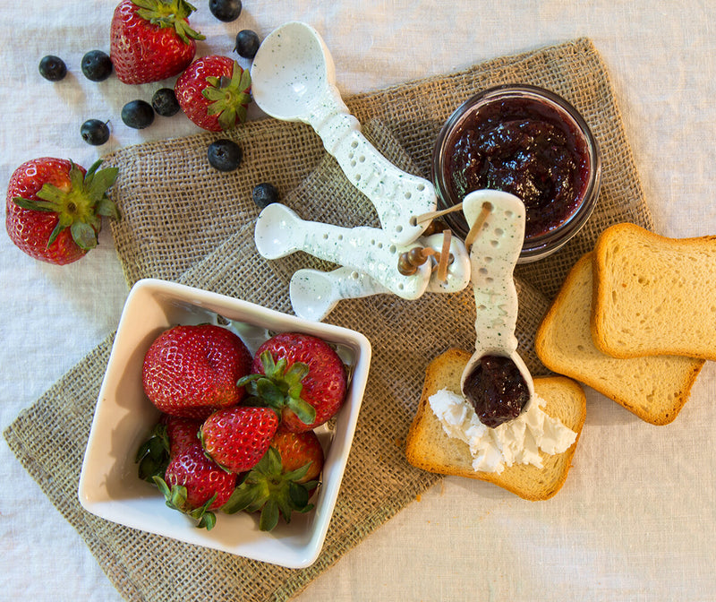 Strawberry Blueberry Jalapeno Artisan Fruit Spread with fruit and breads