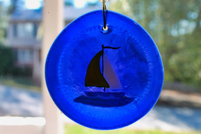 Sailboat on blue glass glass suncatcher