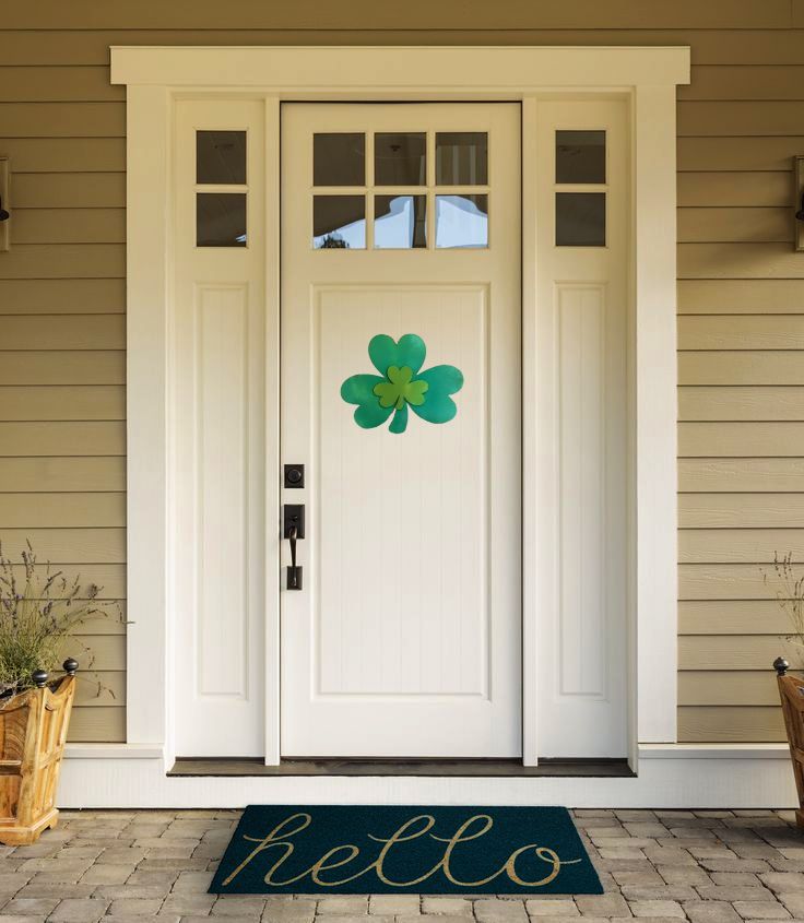 Due Shamrock with Shimmer Accent Finish Door Hanger on your front door.